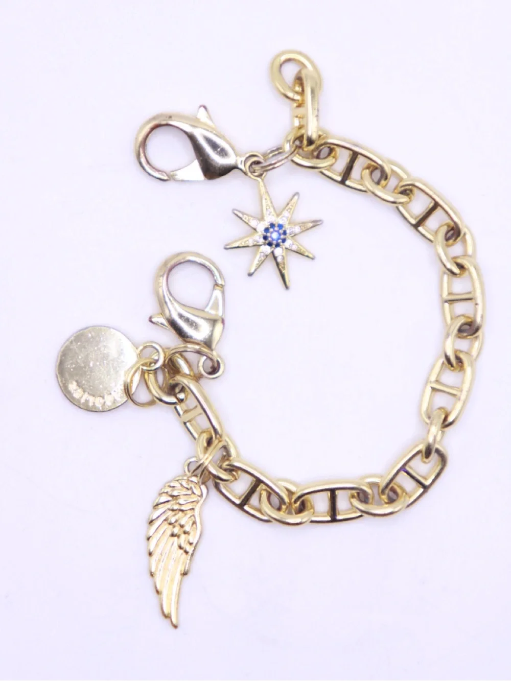 Bandolier Gold-Tone Charm Wristlet Bracelet with Star, Wing & Disc Charms - Picture 1 of 5